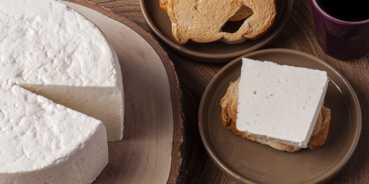 Fresh round cheese, typical of the interior of Brazil in the state of Minas Gerais - Minas frescal. Top view.